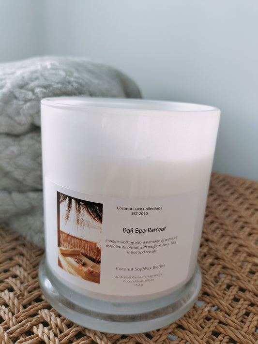 bali spa retreat coconut wax candle in white danube jar with clear lid, double wick, tropical aroma.